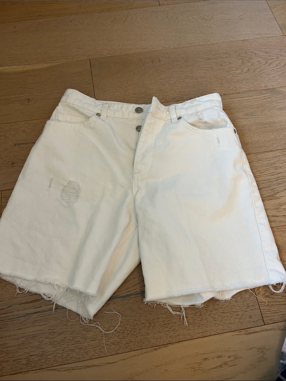 Kookai "Oslo" white denim pants. White jean shorts on the longer side.